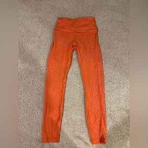 Lululemon wunder under orange leggings
